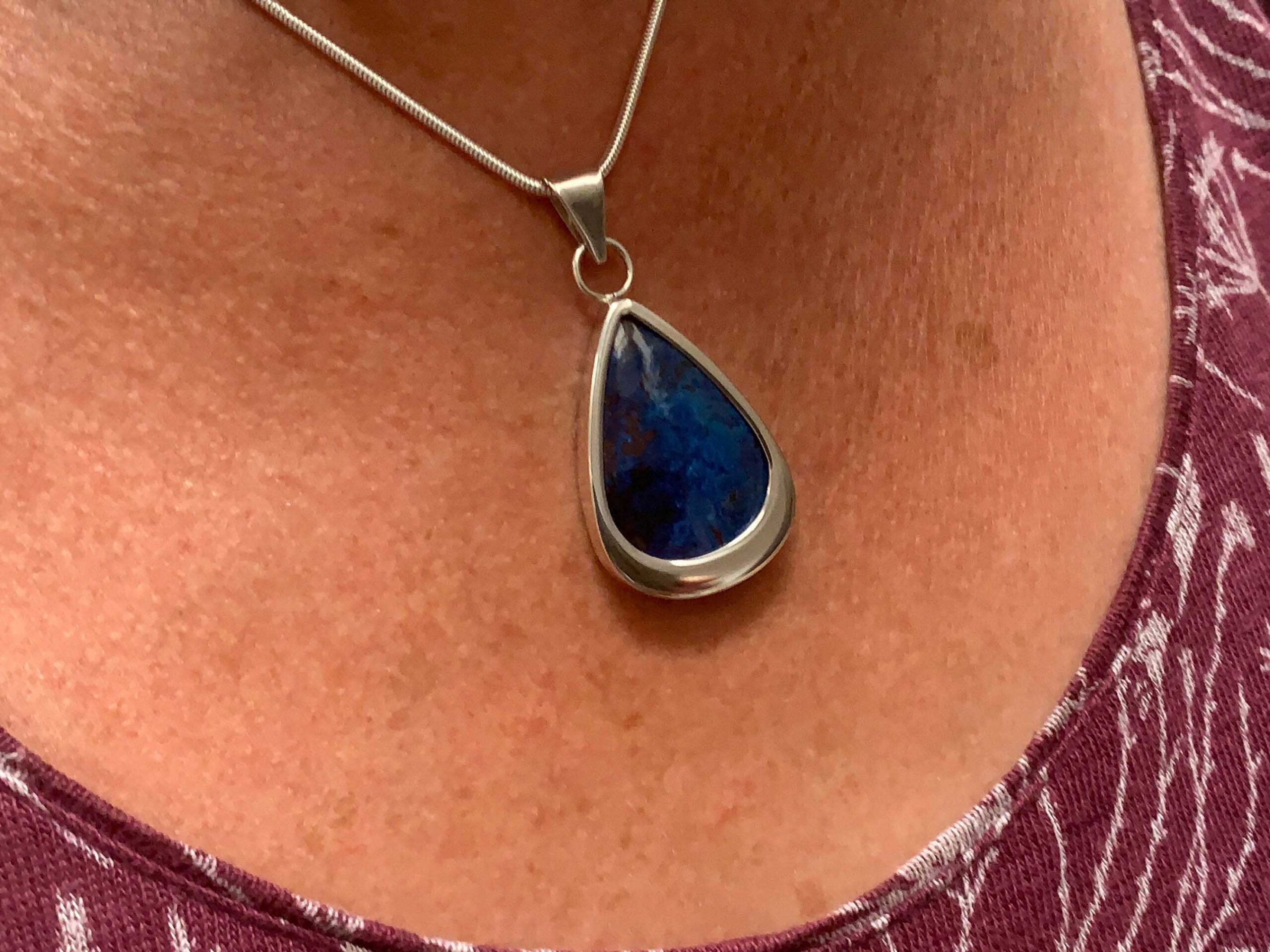 Sterling Silver Blue Shattuckite Pendant - Being worn