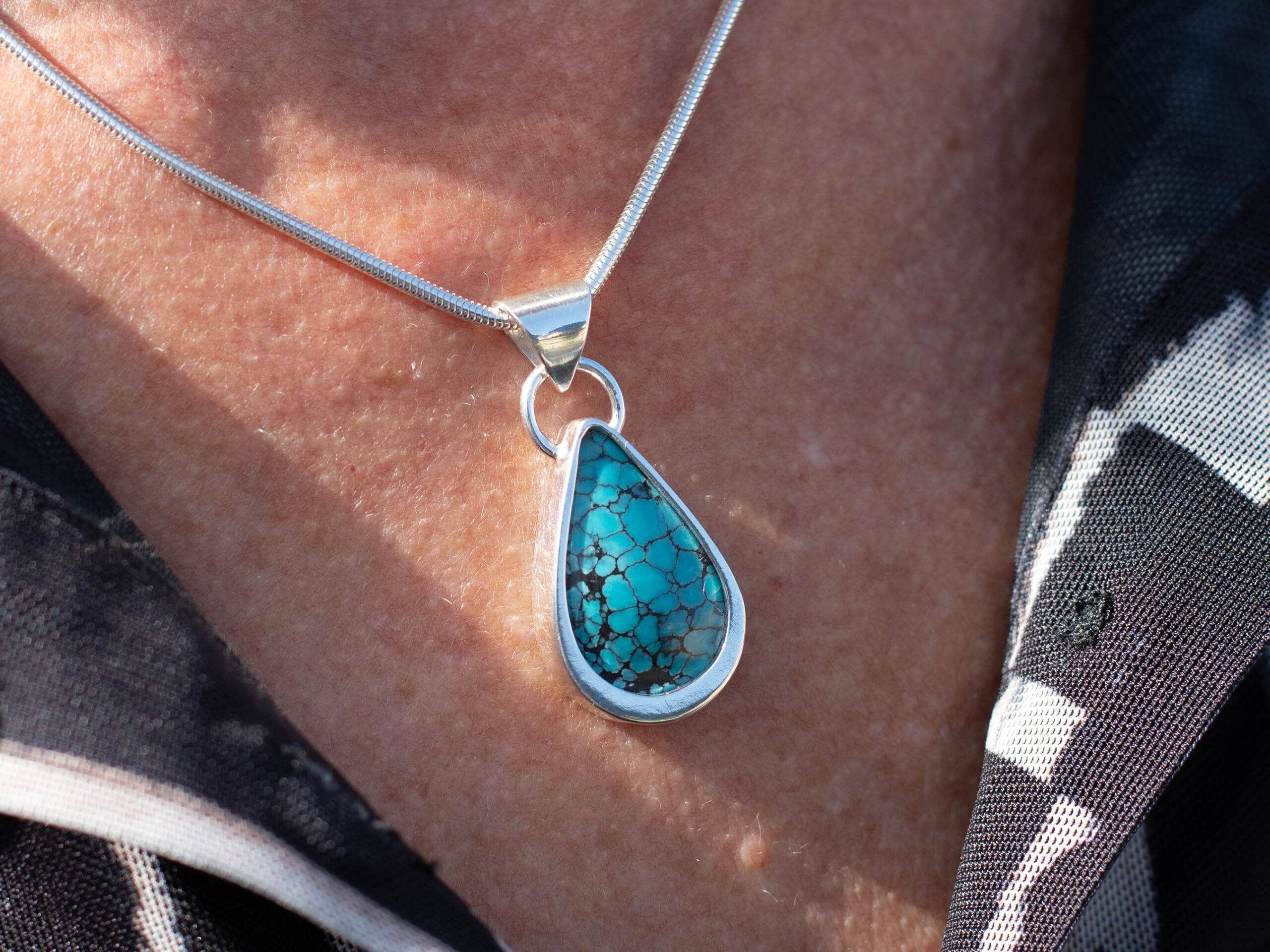 Blue Yungai Sterling Silver Turquoise Pendant - Being Worn