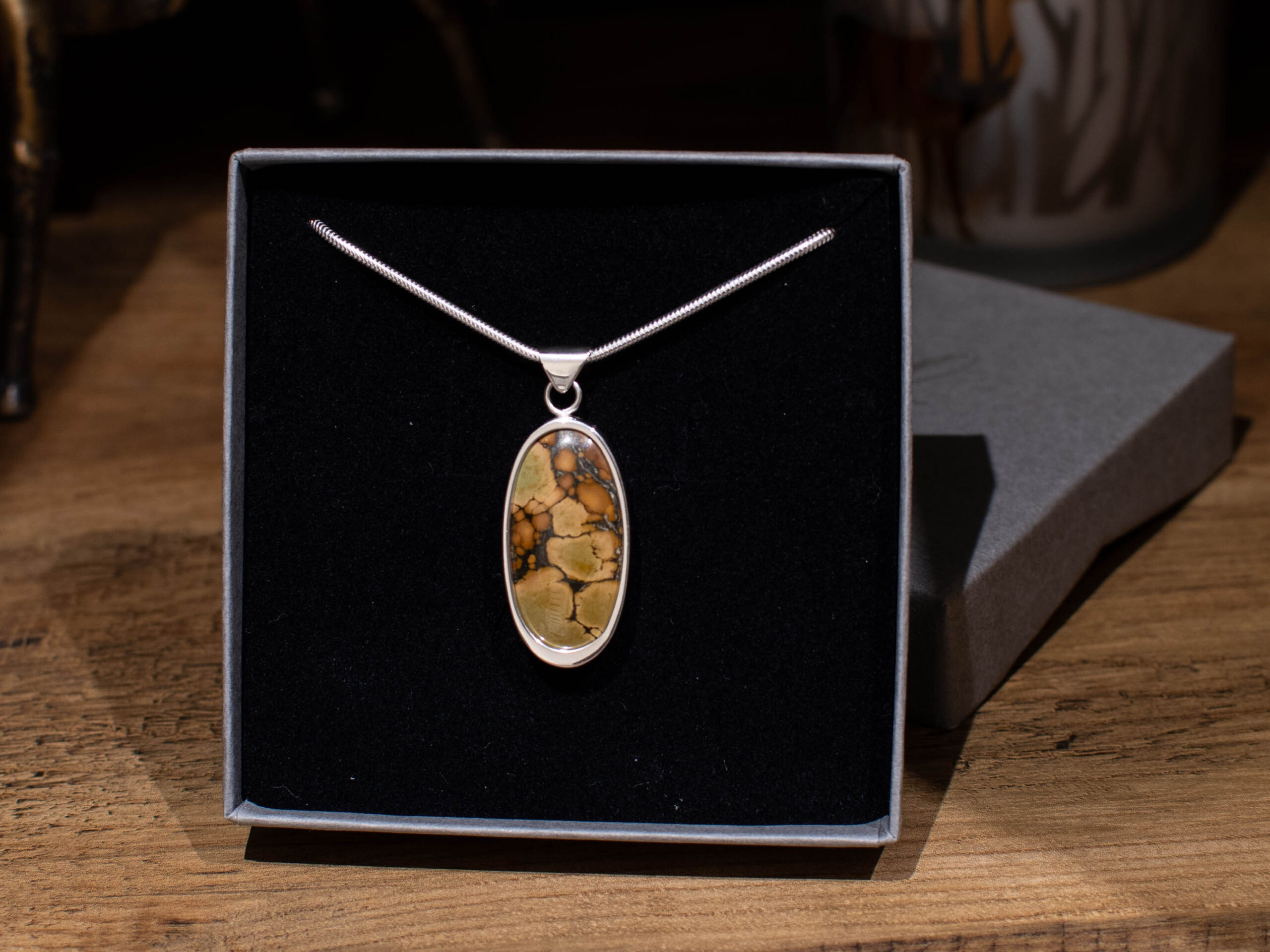 Brown Treasure Mountain Turquoise Pendant - In Box