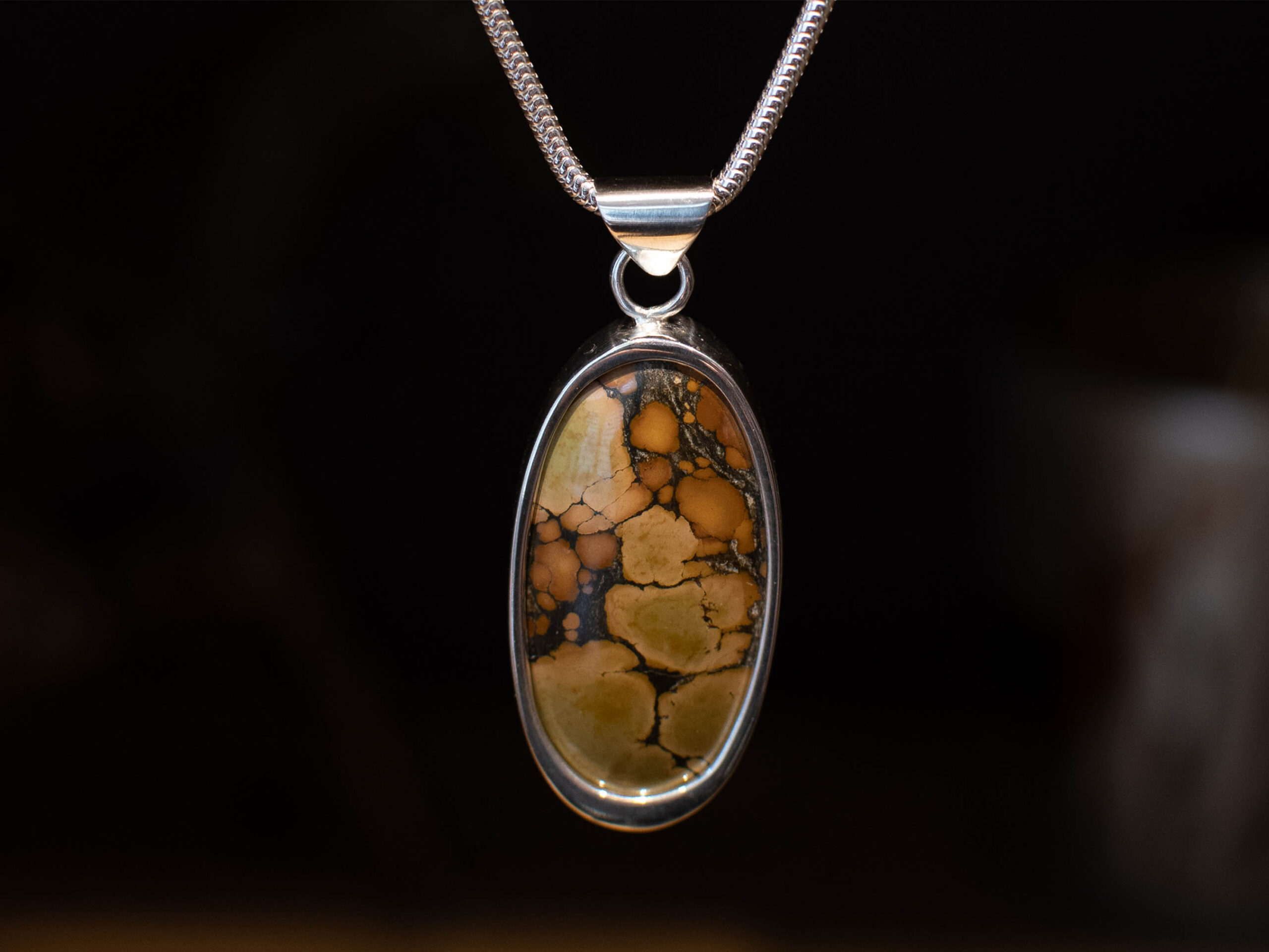 Brown Treasure Mountain Turquoise Pendant - Front